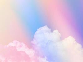 colorful with fluffy clouds on sky. multi color rainbow image. abstract fantasy growing light photo
