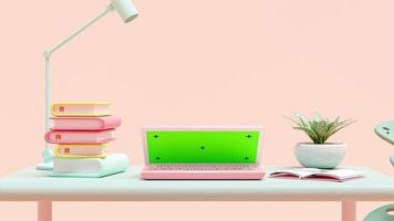 Rosa Laptop-Attrappe auf grünem Schreibtisch mit Notizbuch und Baum an der Seite. grüner bildschirm für banner und logo. Animation, 3D-Darstellung. video