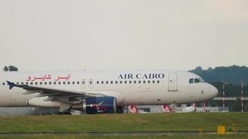 Airplane of Air Cairo at airport video