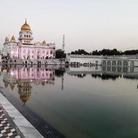 Gurdwara Bangla Sahib is the most prominent Sikh Gurudwara, Bangla Sahib Gurudwara inside view during evening time in New Delhi, India, Sikh Community one of the famous gurudwara Bangla Sahib view photo