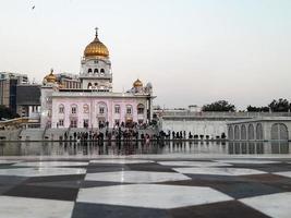 Gurdwara Bangla Sahib is the most prominent Sikh Gurudwara, Bangla Sahib Gurudwara inside view during evening time in New Delhi, India, Sikh Community one of the famous gurudwara Bangla Sahib view photo
