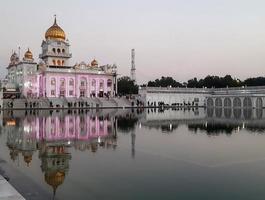 Gurdwara Bangla Sahib is the most prominent Sikh Gurudwara, Bangla Sahib Gurudwara inside view during evening time in New Delhi, India, Sikh Community one of the famous gurudwara Bangla Sahib view photo