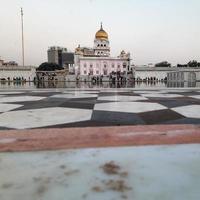 Gurdwara Bangla Sahib is the most prominent Sikh Gurudwara, Bangla Sahib Gurudwara inside view during evening time in New Delhi, India, Sikh Community one of the famous gurudwara Bangla Sahib view photo