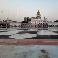 Gurdwara Bangla Sahib is the most prominent Sikh Gurudwara, Bangla Sahib Gurudwara inside view during evening time in New Delhi, India, Sikh Community one of the famous gurudwara Bangla Sahib view photo