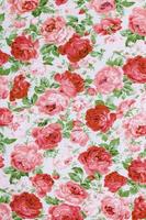 Fragment of colorful retro tapestry textile pattern with floral ornament useful as background photo