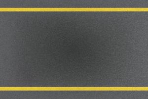 Top view of traffic yellow line marking on metal platform, abstract background photo