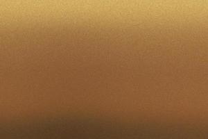 textura metálica áspera de bronce, fondo abstracto foto