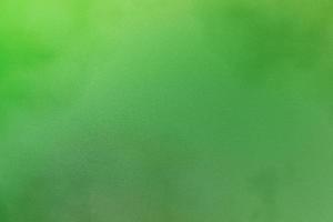 Texture of dirt on green cardboard, abstract background photo