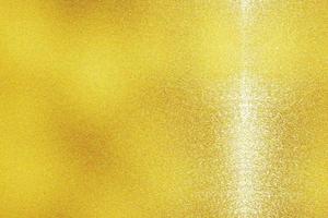 White stains on gold metal surface, abstract background photo