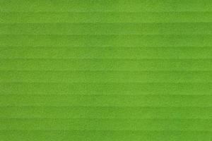 Texture of green paper box, horizontal stripes, abstract background photo