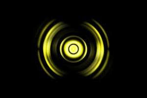 Abstract light yellow ring with sound waves oscillating background photo