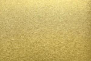 Texture of golden metal, abstract pattern background, selective focus photo