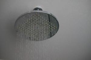Shower and falling water drops. photo