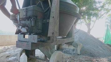 Small cement mixer. Mobile machinery for mixing mortar on the construction site
