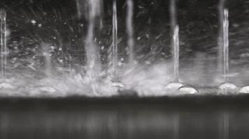 Close up of water fountain drops splashing in slow motion. video