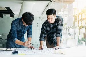 Engineers are helping to design work on blueprints and collaborate on structural analyzing of project types. photo