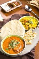 Indian food with naan bread photo