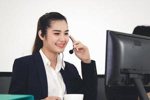 Working of young adult asian woman call center business photo