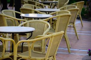 chairs and tables at poolbar photo