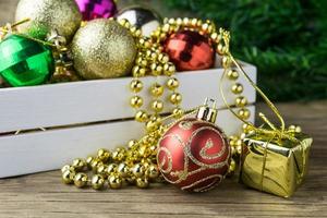 Christmas decorations on old wooden background photo