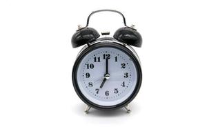 Alarm clock on white background photo