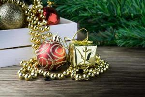 Christmas decorations on old wooden background photo