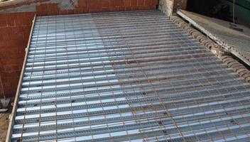 Detail of construction works in a building site with corrugated photo