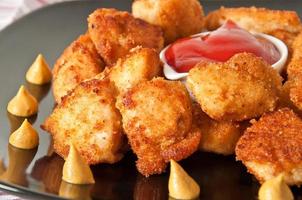 Fresh fragrant fried chicken nuggets photo