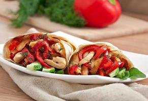 pita stuffed with chicken and peppers photo