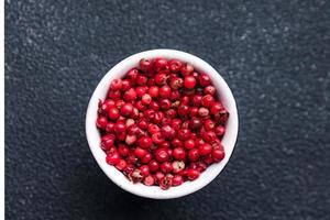 pink peppercorn pepper allspice peppercorns  spices healthy meal food diet snack on the table copy space food photo