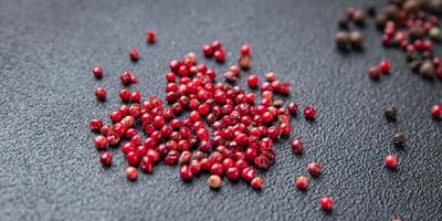 pink peppercorn pepper allspice peppercorns  spices healthy meal food diet snack on the table copy space food photo