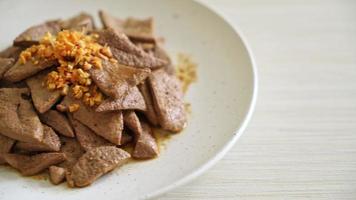 homemade stir-fried pork liver with garlic on plate video