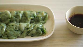 steamed chives dumplings with sauce - Asian food style video