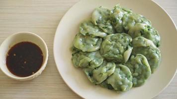 steamed chives dumplings with sauce - Asian food style video