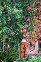 Rothenburg ob der Tauber, Northern Bavaria, Germany, 2014. Restaurant door in the Castle gardens