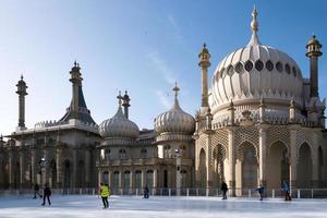 BRIGHTON, EAST SUSSEX, UK, 2013. People ice skating at the Royal Pavilion photo