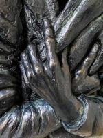 CHICHESTER, WEST SUSSEX, UK, 2014. Hands in Chichester Cathedral photo