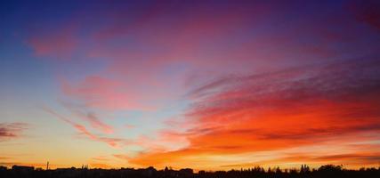 Colorful sunset over the mountain hills photo