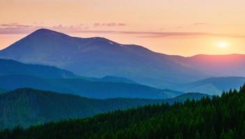 Beautiful sunset in the Carpathian Mountains photo