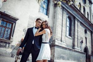 happy and loving couple walking and make photo in the old city