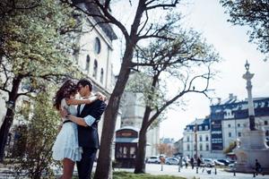 happy and loving couple walking and make photo in the old city