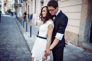 happy and loving couple walking and make photo in the old city