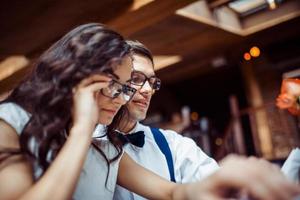 Romantic couple in love bonding in cafe photo