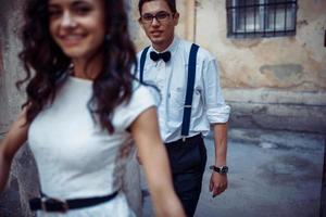 happy and loving couple walking and make photo in the old city