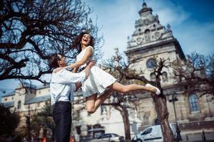 happy and loving couple walking and make photo in the old city