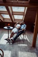 Romantic couple in love bonding in cafe photo