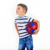 little boy footballer isolated photo