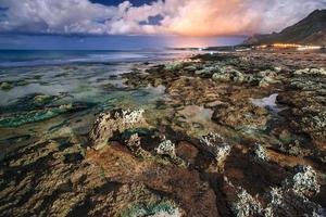 Sea coast at sunset photo