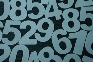 Background of numbers. from zero to nine. Numbers texture. Finance data concept. Matematic. Seamless pattern with numbers. financial crisis concept. Business success. photo