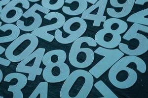Background of numbers. from zero to nine. Numbers texture. Finance data concept. Matematic. Seamless pattern with numbers. financial crisis concept. Business success. photo